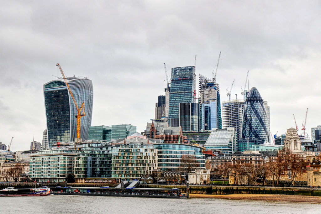 Landscape of the City of London, with numerous construction cranes. Taken from the south of the river.