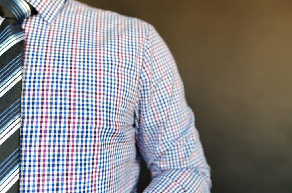 Man wearing shirt and tie