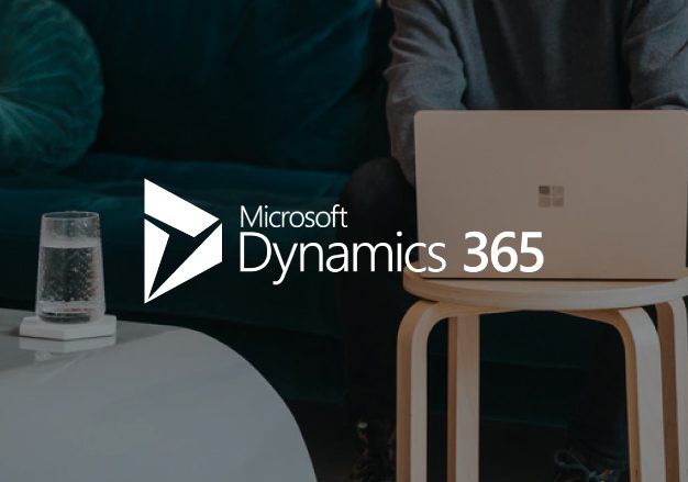 Microsoft Dynamics 365 logo over backgorund of laptop
