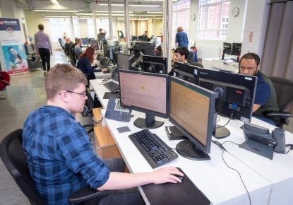 our team at their computers