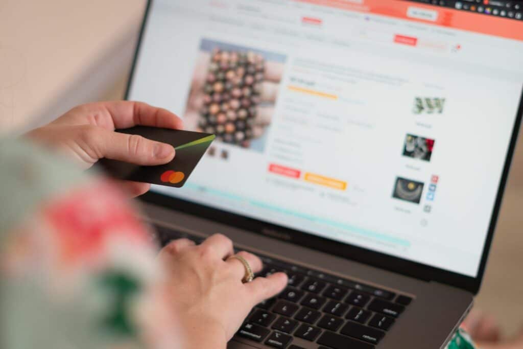lady making payment and checking out from cart