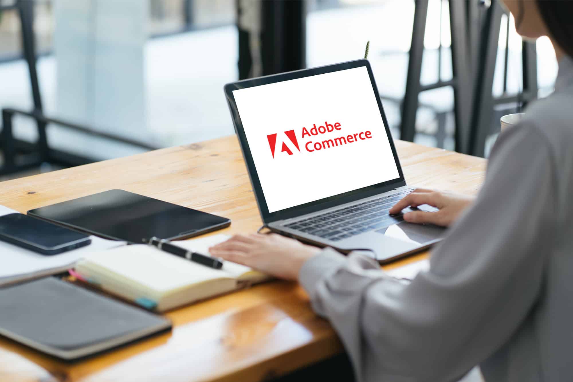 lady working with adobe commerce